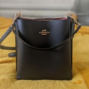 MillieCoach Black Crossbody Bag with Gold Accents